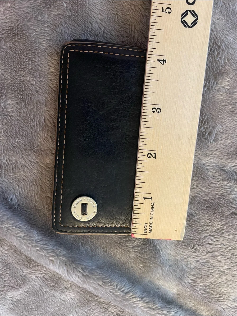 Cole Haan Black Leather Bi-Fold Wallet with Tan Contrast Stitching